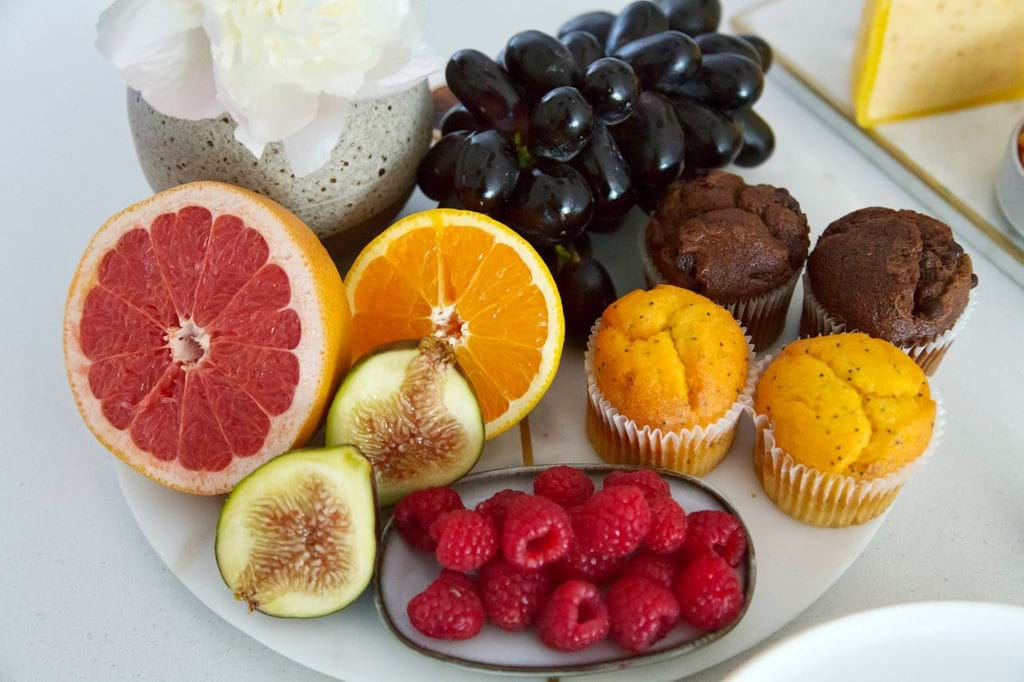 gluten free cakes and fruit on a plate